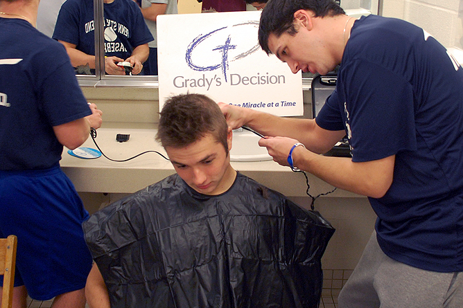 Behrend Baseball Cuts Hair for Grady's Decision